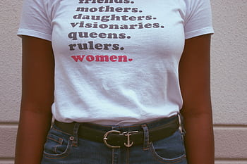 Close-up of a t-shirt celebrating women's roles and empowerment. HD wallpaper