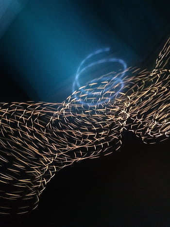 Stunning abstract light painting showcasing vibrant motion and fluidity. HD phone wallpaper