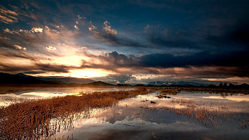 magnificent lakescape, clouds, grass, mountains, lake, sunset HD wallpaper