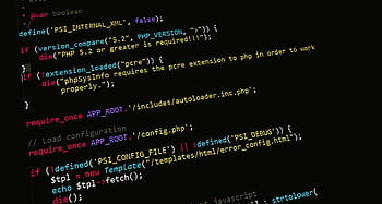 A close-up view of PHP code displayed on a computer screen, highlighting programming and development concepts. HD wallpaper