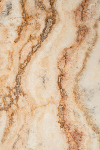Close-up view of a beige and brown marble texture showcasing natural patterns. HD phone wallpaper