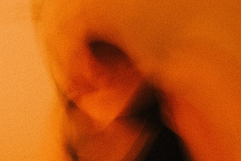 Dynamic blurred with warm orange tones and abstract motion effects. HD wallpaper