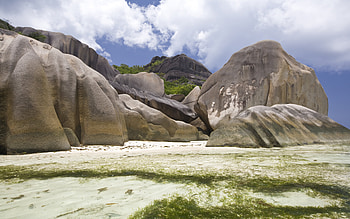 Imposing Beach, blue, sand, beaches, beautiful, grass, rock, formations, clouds, nature, sky HD wallpaper