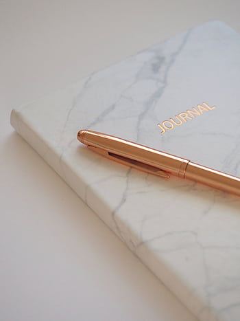 Minimalist marble journal with a gold pen, perfect for elegant stationery and writing inspiration. HD phone wallpaper