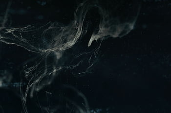 Abstract dark nebula with swirling patterns and ethereal textures creating a cosmic feel. HD wallpaper