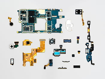 Exploded view of smart components showcasing intricate technological design. HD wallpaper