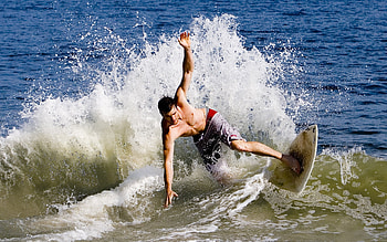 Surfing thrill, Action-packed sport, Surfing passion, Dynamic backdrop HD wallpaper