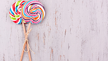 Lollipop background , Eye-catching design, Sweet temptation, Candy lover's delight HD wallpaper
