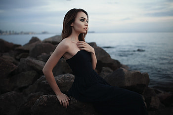 Girl Sitting On Rocks, girls, rocks, black, dress HD wallpaper