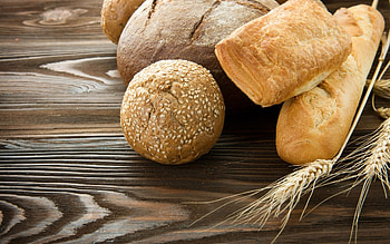 Freshly baked loaf, Warm crusty bread, Delicious aroma, Sliced perfection HD wallpaper