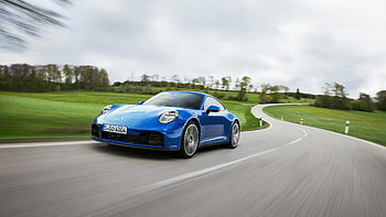of the Iconic Porsche 911 Carrera on the Move, car, Porsche, Porsche 911 Carrera HD wallpaper