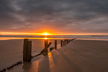 Nature, Sunset, Sea, Beach, Sand, Pillars, Posts HD wallpaper