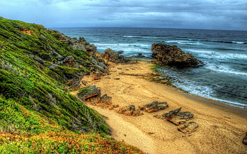 Beautiful, sand, colors, peaceful, beauty, beach, waves, ocean, sea, grass, rocks, stormy, green, view, clouds, nature, sky, lovely, storm HD wallpaper