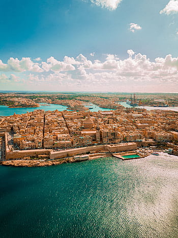 Stunning aerial view of Valletta, Malta, showcasing its historic architecture and coastal beauty. HD phone wallpaper