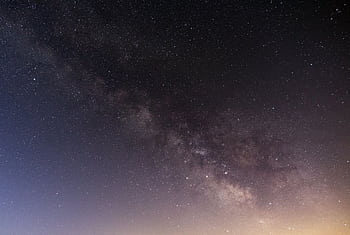 Breathtaking view of the starry night sky featuring the Milky Way and countless stars. HD wallpaper