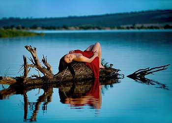 Like a mermaid, branch, lying, blue hills, red dress, lake, woman HD wallpaper