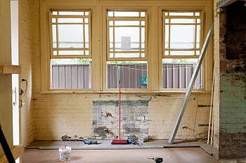 An empty room featuring large windows, ready for renovation in Sydney, Australia. HD wallpaper