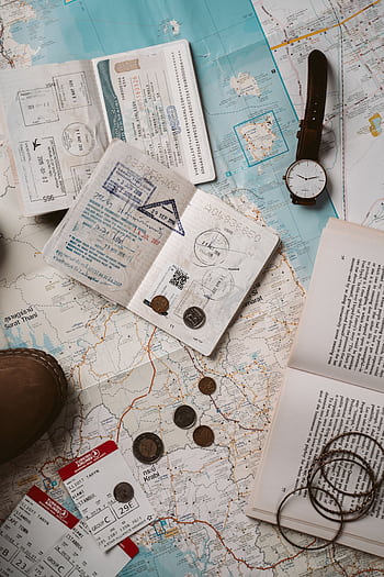 Explore wanderlust with flatlay of passport, map, and travel essentials. HD phone wallpaper