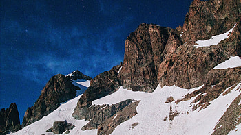 Snow Covered Mountain Under A Night Sky, snow, mountains, nature, sky HD wallpaper