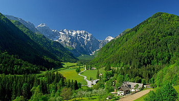 spectacular alpine valley in spring, valley, road, mountains, forest, village HD wallpaper