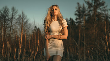Blonde Girl Model Is Wearing White Dress With Sunrays On Face Standing In Blue Sky Background Girls HD wallpaper