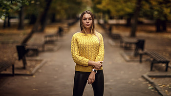 Girl Model Is Standing In Blur Park Background Wearing Yellow Top And Black Jeans Girls HD wallpaper
