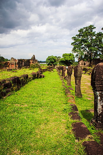 Explore the lush, historic ruins of Vat Phou, a UNESCO World Heritage site in Laos. HD phone wallpaper