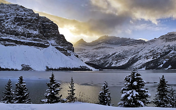 Winter, snowy, winter splendor, peaceful, sunrise, lake, snow, clouds, trees, nature, sky, mountains, splendor, winter time, sunset HD wallpaper