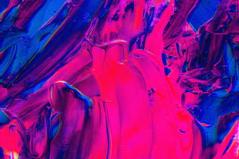 Dynamic and vibrant abstract acrylic painting with swirling pink and blue colors. HD wallpaper