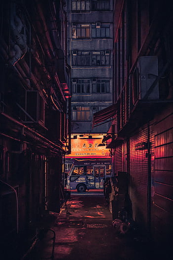 A dark alley in Hong Kong at night, illuminated by vibrant city lights and signage. HD phone wallpaper