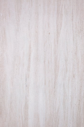 Light stone surface with natural texture, ideal for minimalistic designs. HD phone wallpaper