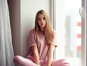 Girl at window, pink outfit, blonde and beautiful HD wallpaper