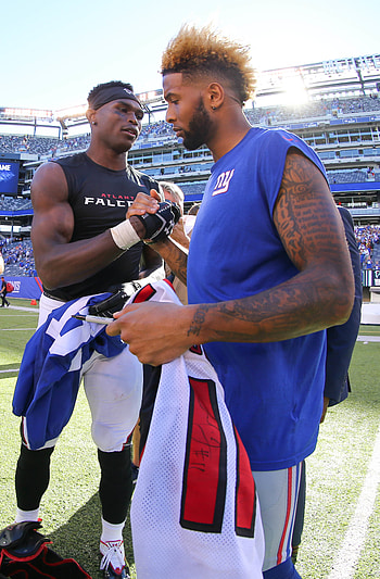 Atlanta Falcons wide receiver Julio Jones and New York Giants wide receiver Odell Beckham Jr. exchange jerseys after their game at MetLife Stadium. HD phone wallpaper