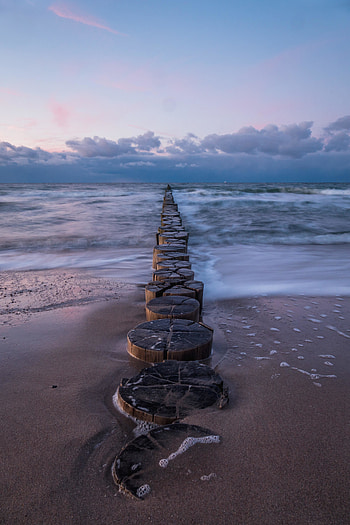 Old pier poles, beach, pier HD phone wallpaper