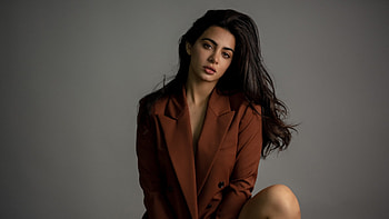 Actress Emeraude Toubia Is Wearing Brown Dress Sitting In Grey Background Girls HD wallpaper
