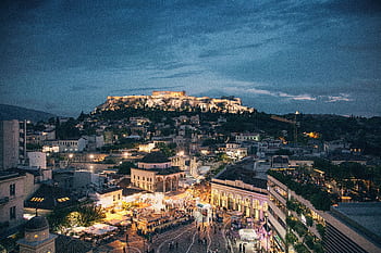 A mesmerizing night skyline of Athens featuring the illuminated Acropolis. HD wallpaper