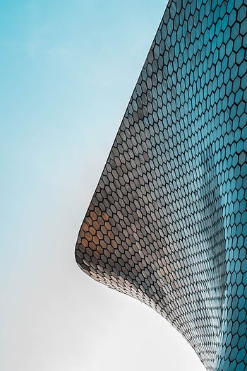 Striking modern architecture of Museo Soumaya with unique curved honeycomb design. HD phone wallpaper