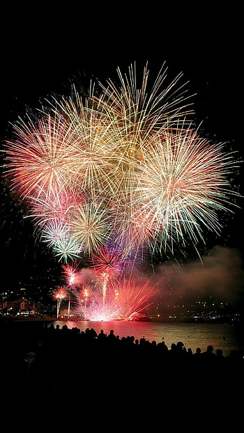 Illuminating fireworks, Dazzling spectacle, Magical lights, Nighttime beauty HD phone wallpaper