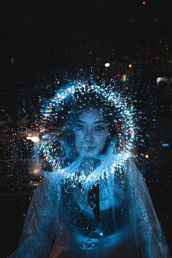 A captivating night portrait of a woman with vibrant fantasy light effects. HD phone wallpaper