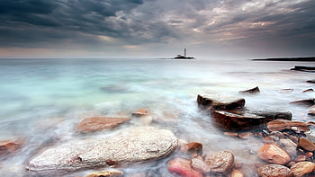 distant lighthouse, fun, cool, nature, ocean HD wallpaper