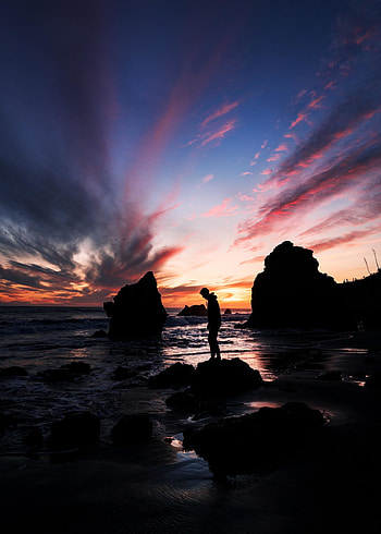 Man, outdoor, silhouette, coast, rocks, sunset HD phone wallpaper