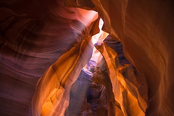 Explore the stunning sandstone formations and vibrant colors of Antelope Canyon, Arizona, in this mesmerizing . HD wallpaper