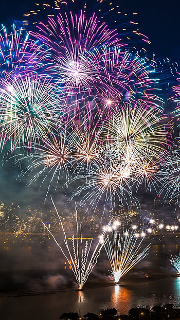 Holiday fireworks display, Festive celebration, Burst of colors, Spectacular show HD phone wallpaper