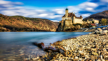 Castle at the Danube river, Austria, alps, water, hills, clouds, sky, stones HD wallpaper