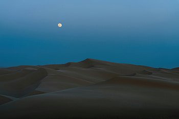 A Full Moon Rising Over A Desert Landscape, moon, desert, landscape, nature HD wallpaper