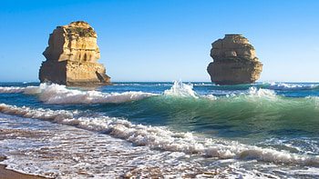 mighty monument rocks on a beach, sea, waves, monuments, rocks, beach HD wallpaper