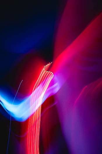 Vibrant abstract with dynamic red and blue light streaks over a dark background. HD phone wallpaper