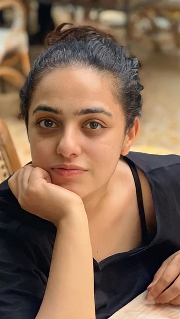 Nithya Menon, multilingual actress HD phone wallpaper