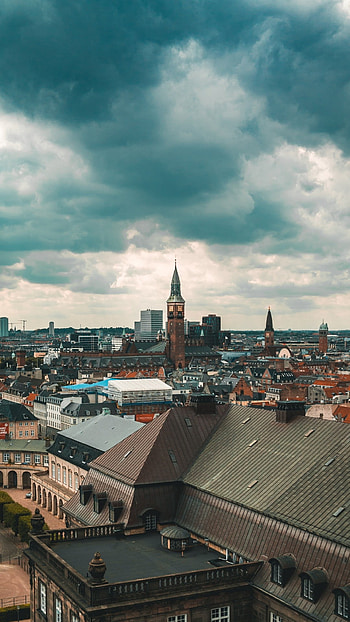 Architectural marvels of Copenhagen, Impressive skyline, Cloud-filled backdrop, -worthy HD phone wallpaper