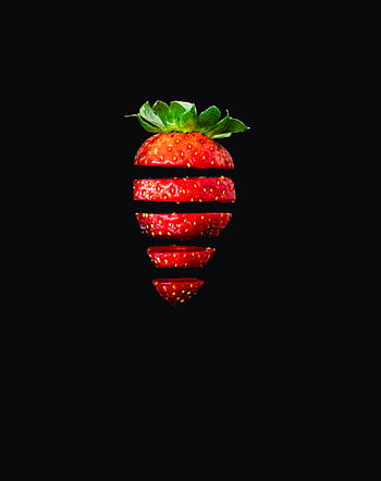 Creative of a sliced strawberry arranged artistically against a black background. HD phone wallpaper